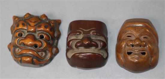 Three Japanese Meiji carved wood Noh mask netsukes, various, all signed